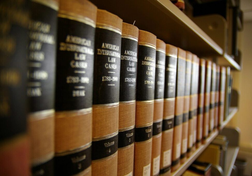 A row of law books on the shelf.